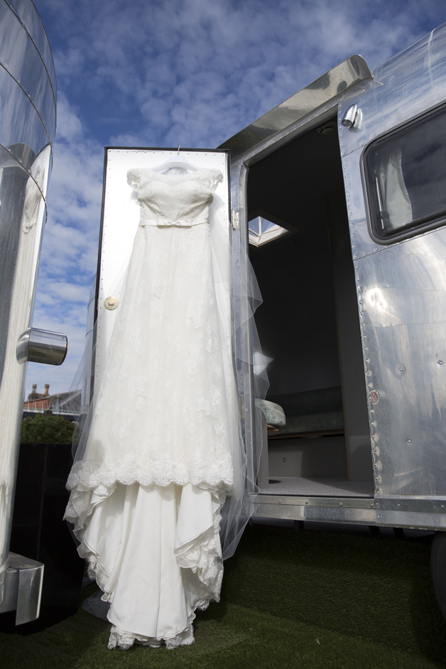 close up of wedding dress hanging on retro rocket at Brook's Guest House in Bristol