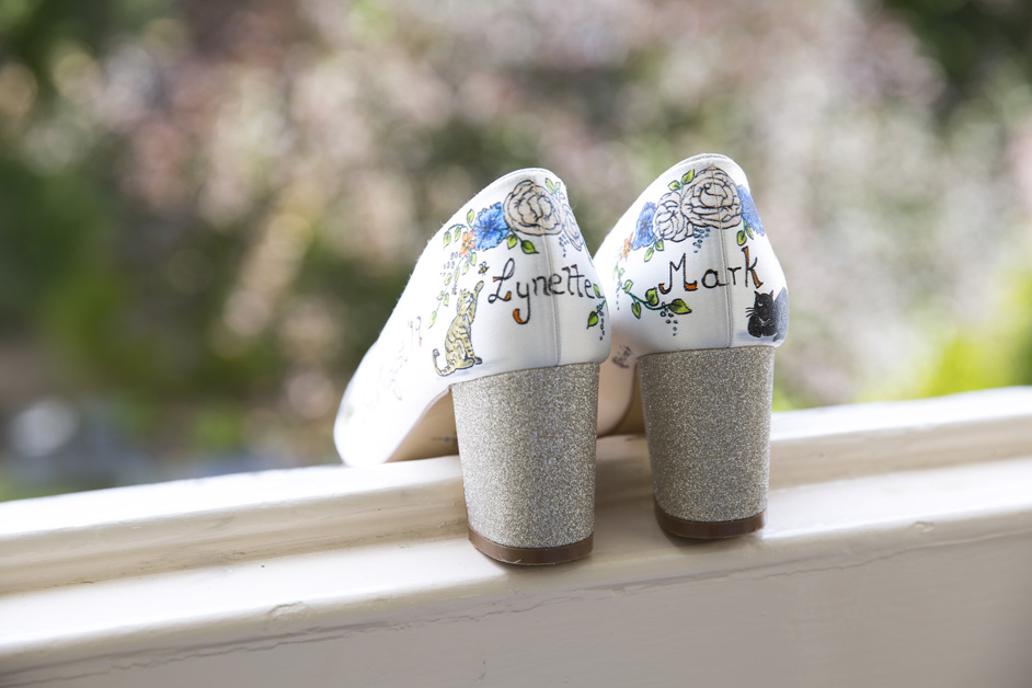 personalised Rainbow wedding shoes with couple's names and illustrations of their cats