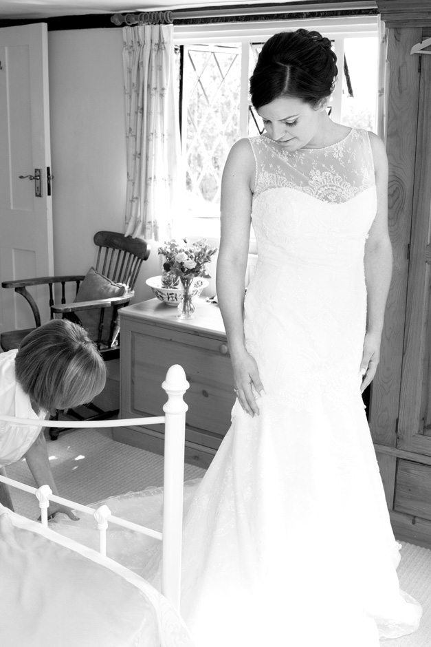 bride's mum checking dress at Smarden village home in Kent