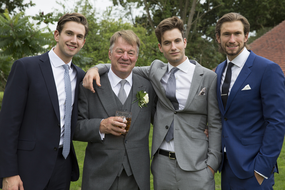 father of the bride with wedding guests at Smarden countryside village in Kent