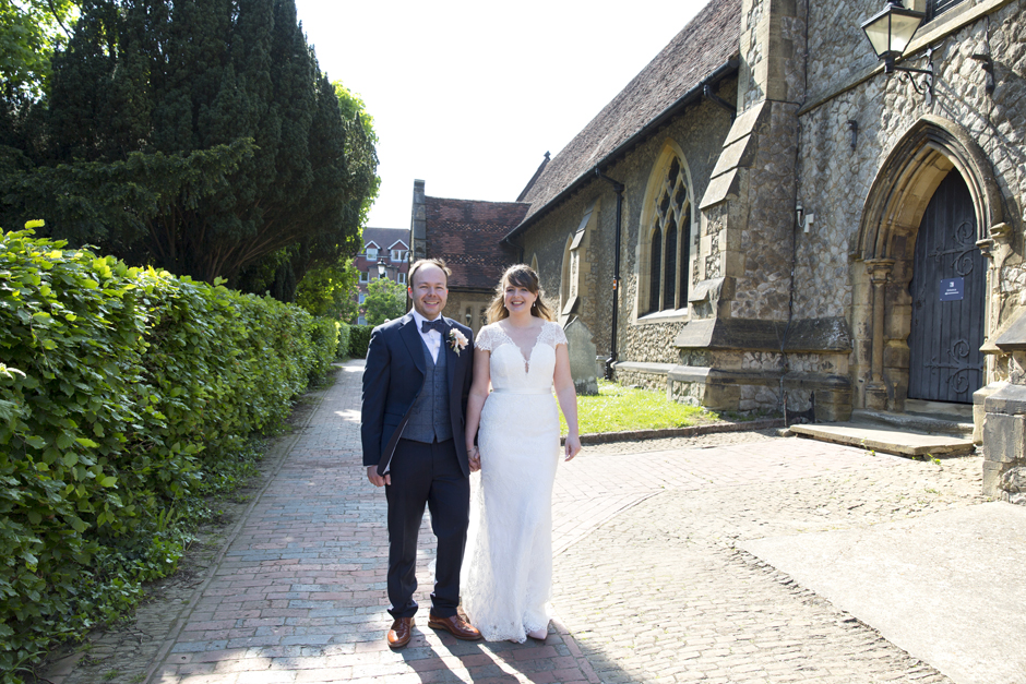 Bride and Groom outside church path at St Stephen's Church wedding in Tonbridge, Kent