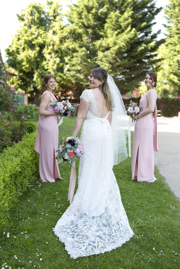 Bride with bridesmaids portrait at Tonbridge wedding in Kent