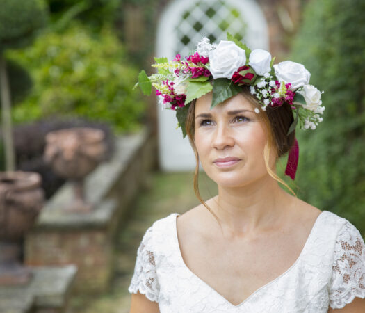 Bride with artificial flower headers in Benenden Kent, captured by Kent wedding photographer Victoria Green,