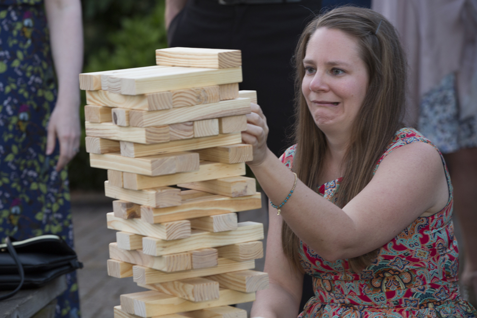 wedding guest looking nervous playing jenga