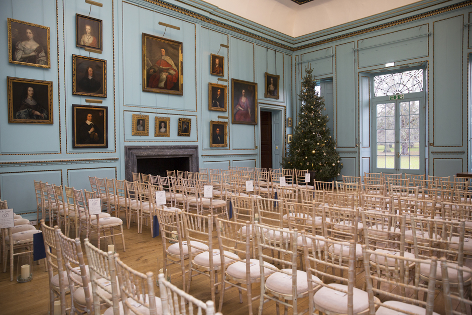 Wedding ceremony room ready with Christmas tree at Bradbourne House in East Malling, Kent.