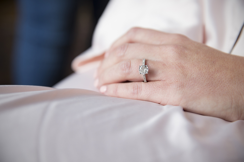 Close-up of bride's diamond engagement ring during morning bridal prep at Bradbourne House in East Malling, Kent.