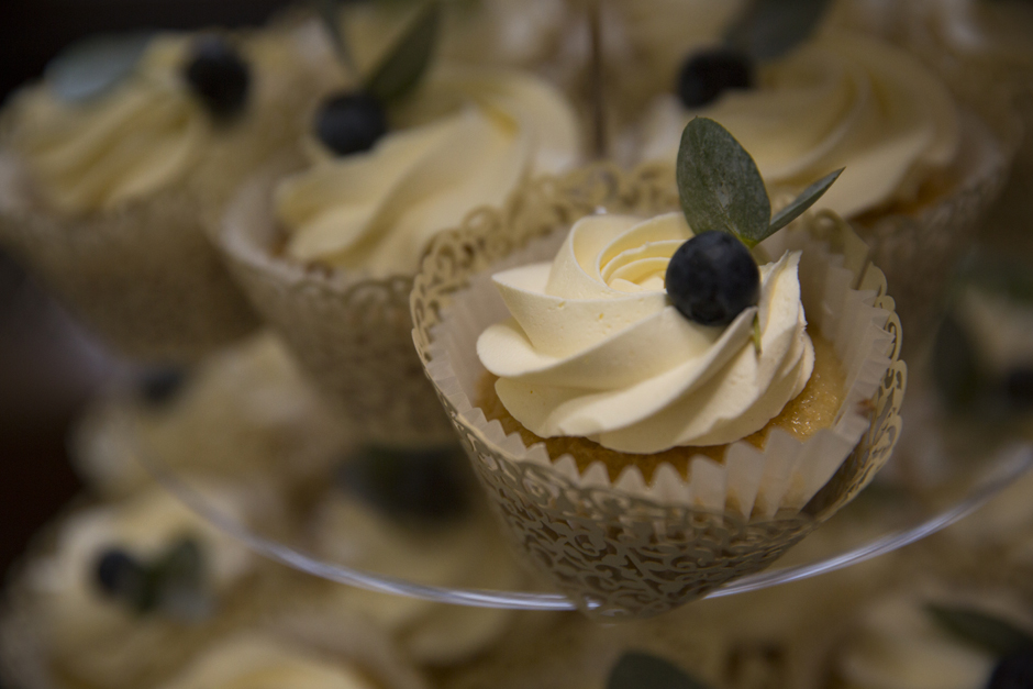 Close-up of vanilla cupcake with berry on top at Bradbourne House in East Malling, Kent.