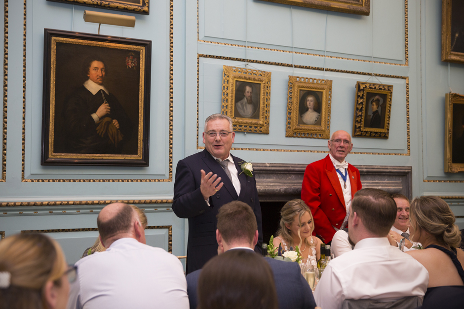 Father of the Bride standing doing his speech with toastmaster by his side captured at Bradbourne House in East Malling, Kent.