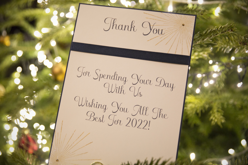 Thank you poster on Christmas Tree reading, "Thank you For Spending Your Dat With Us. Wishing You All The Best For 2022!" Captured at Bradbourne House in East Malling, Kent.