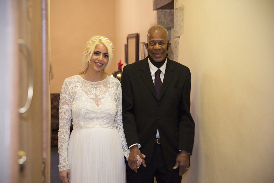 Bride and Bride's Father walking into the Undercroft register office room in Archbishop's Palace in Maidstone, Kent