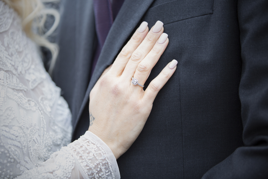 Close up of bride's engagement ring outside Archbishop's Palace in Maidstone, Kent. Captured by Victoria Green Photography.