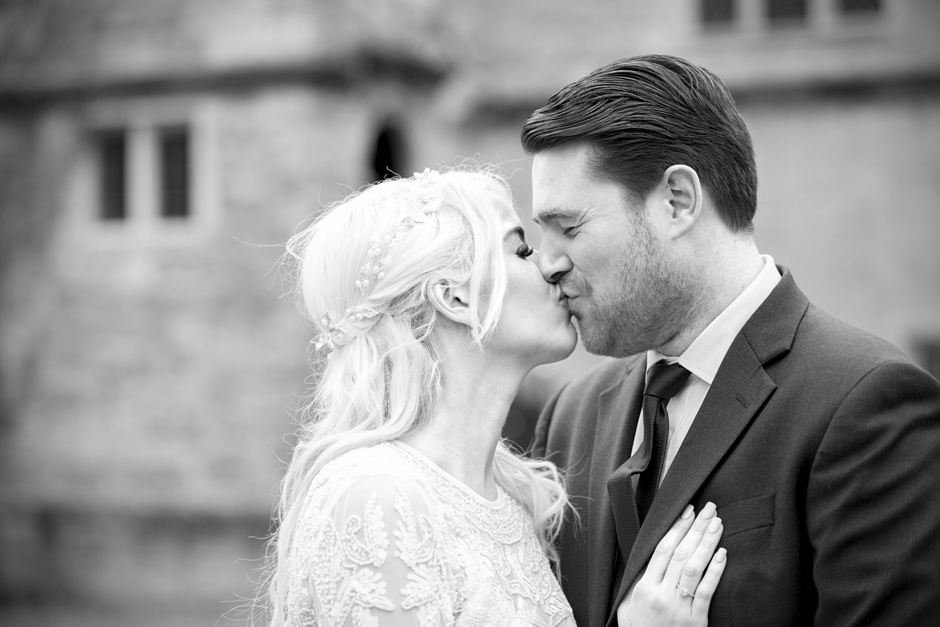 Bride and Groom kissing at Archbishop's Palace in Maidstone, Kent. Captured by Victoria Green Photography.